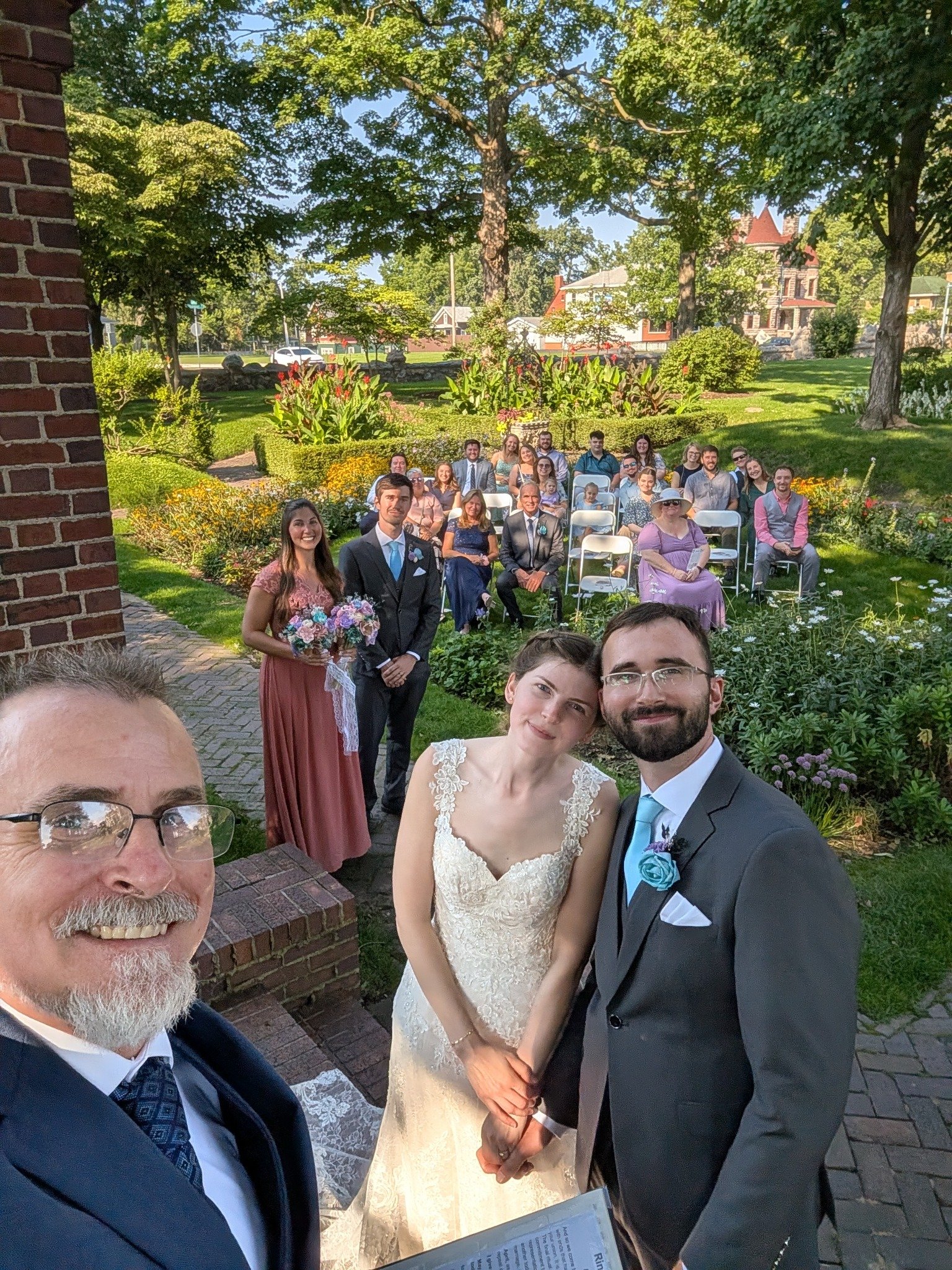 Brown County Ceremonies officiant with a newly married couple and wedding guests
